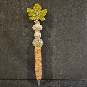 Gold and Green Decorative Pen